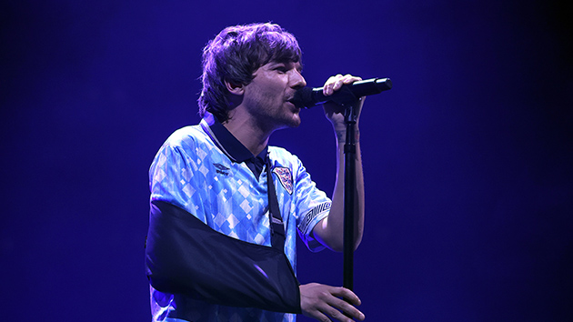 Louis Tomlinson forced to postpone fan events after breaking arm “pretty badly”
